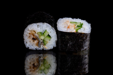  Unagi maki, smoked eel, cucumber, sesame
