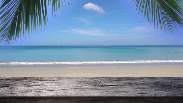 Professional Video. 4K Top wood table on beach sea outdoor.