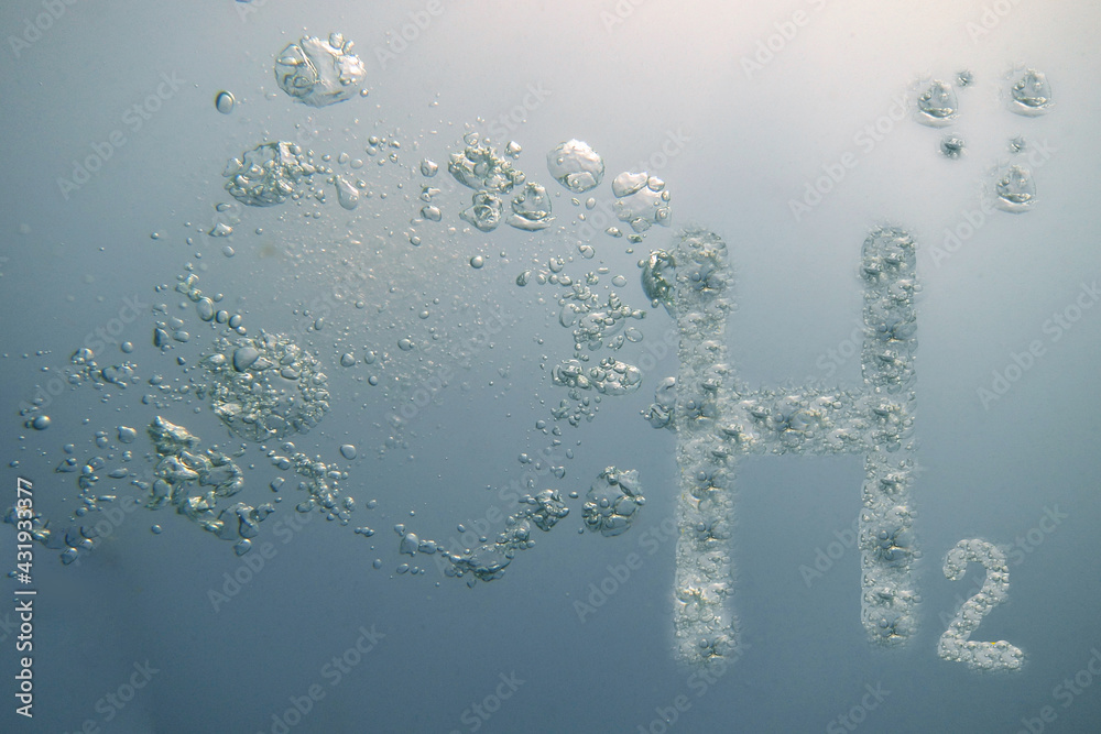 Wall mural h2 hydrogen letters in light blue water with many bubbles