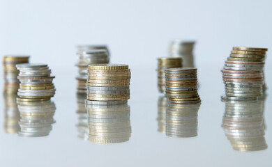 Stacks of coins on the glass