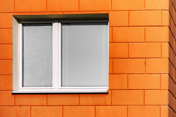 White blinds on closed window