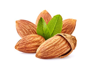Almonds with leaves in closeup isolated on white background. Nuts isolated.
