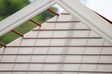 With white synthetic wood made from fiber cement, builders attached the roof instead of wood. Get a...