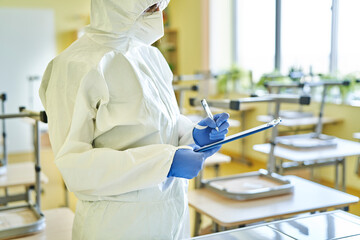 Close up of inspection before reopening the school