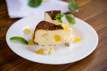 sweet baked cottage cheese casserole with nuts and candied fruits