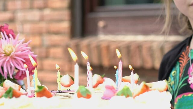 Birthday cake with candles, slow motion
