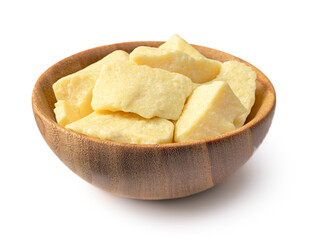 cocoa butters in the wooden bowl, isolated on white background