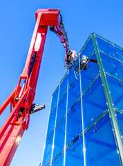 modern lifter in front blue sky