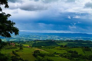 Fototapeta premium Beautiful general view of a valley in Italian Tuscany. Land for cultivation of vineyards.