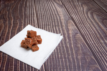 Black bread crackers. Crackers in a hungry time. Hunger.