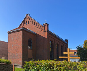 The photos show close-ups of architectural details and a general view of the Orthodox Church of the Transfiguration of the Lord in Mrągowo, Masuria, Poland, built in 1896 in the Neo-Romanesque style.