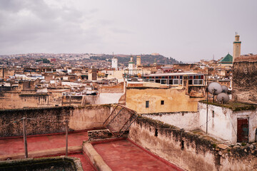 Fototapeta na wymiar View of Fez City from the roof top terrace. Fes el Bali Medina, Morocco, Africa.
