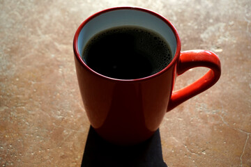 coffee beans and red cup