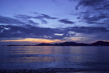 Beautiful seascape with cloudy sky. Sunset on the beach.