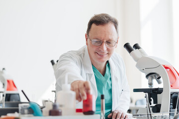 Senior researcher working in lab