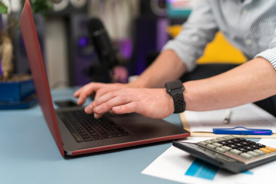 Businessman using laptop while working at home office
