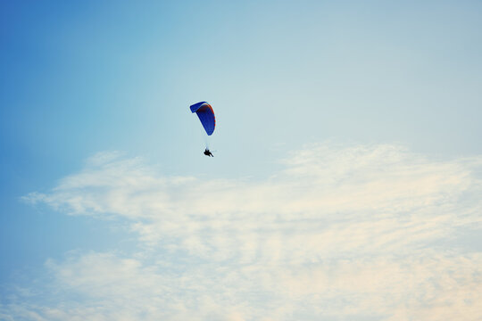 Paraplane on the blue sky background, leisure activity.