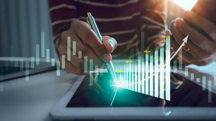 Business woman trader with stock market projects growth graphs running and increase statistics rates.