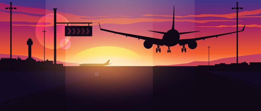 Airplane landing at sunset. Panoramic view of the evening airport