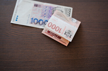Serbian and Croatian paper money, 1000 kunas i 1000 dinars bills, high angle view