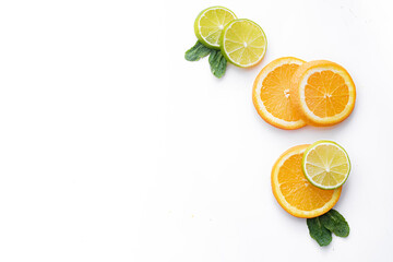 Citrus fruits on a white background are cut . Colored fruits. The citrus family. citrus sliced layout top view on a white background. An article about healthy eating. Keto diet.