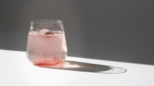 Collagen powder in glass of water. Super food additives. Anti age concept.