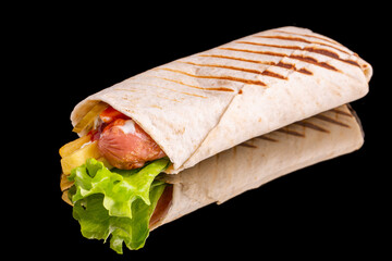 Wheat tortilla with french fries, sausage, pickled cucumber, garlic sauce, ketchup, onion fries