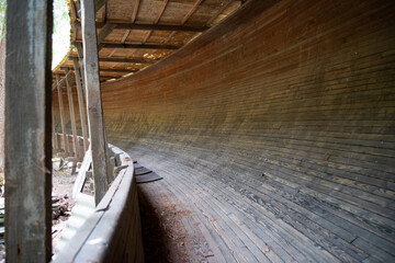 Old wooden bobsleigh track. Wooden board sledge track bend.