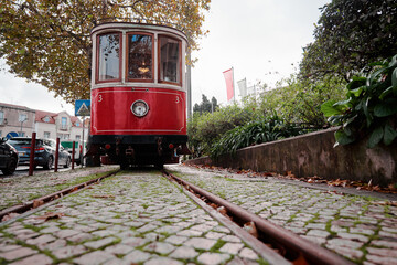 Fototapeta na wymiar Old retro tram train. Attraction in Sintra, Portugal.
