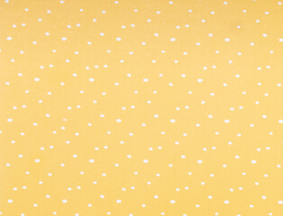 yellow background with white dots
