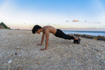 A man doing sports by the beach