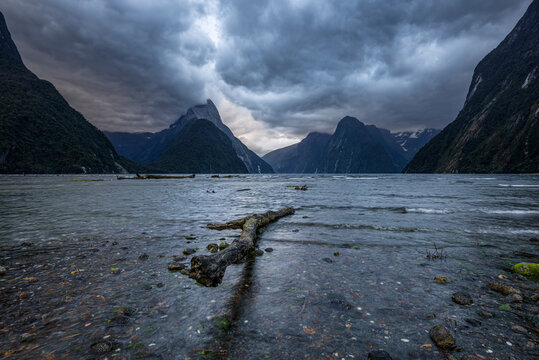 New Zealand, Fiordland, Storm clouds over scenic coastline of Milford Sound