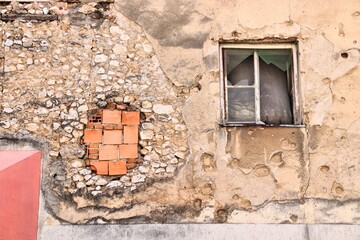 Mortar hole and bullet holes in Bosnia