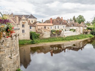 Naklejka na ściany i meble view down the river from the 14th century bridge at Montmorillon France