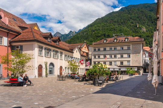 Kornplatz square with sidewalk restaurants and cafes in old town of Chur, Switzerland