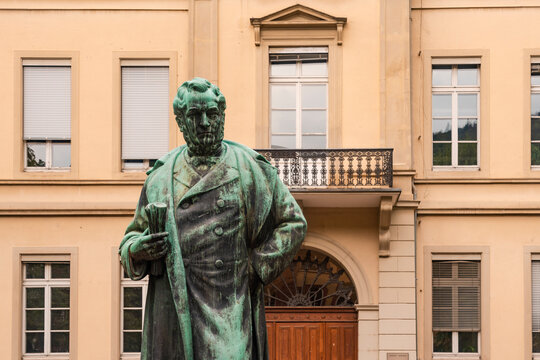 Psychology institute in Heidelberg university with Robert William statue in Anatomiegarten at the old city, Heidelberg, Germany