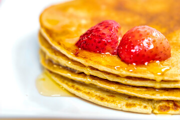 stack of pancakes with syrup