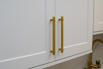 Fototapeta handles on the kitchen cabinet furniture metal door obraz