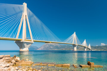 Modern Bridge Rion-Antirion. The bridge connecting the cities of Patras and Antirrio, Greece - obrazy, fototapety, plakaty