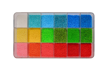 Container with colored beads.
