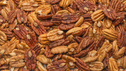 Tasty pecan-nut background. Top view.