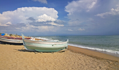 Fototapeta na wymiar Fishing boats on the Mediterranean beach in Calella