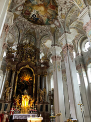 Oppulent Bavarian Baroque and rococo interior style architecture inside Roman Catholic church or...