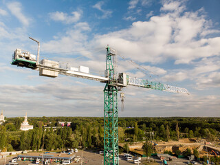Building tower crane building a house