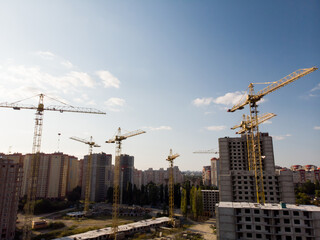 Building tower crane building a house