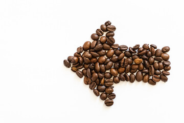 coffee beans on a white background in the shape of an arrow. coffee direction.