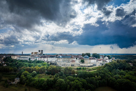 France, Haute-Marne, Langres, Dramatic clouds over historic town