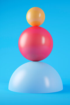 Three dimensional render of two geometric spheres stacked on top of hemisphere