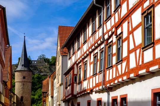 Germany, Bavaria, Karlstadt am Main, Half-timbered house with Turm am Maintor&not;&dagger;in background