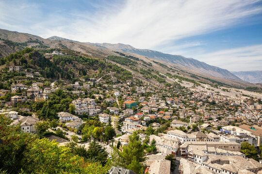 Old town amidst trees against cloud sky at Mali I Gjere, Gjirokaster, Albania